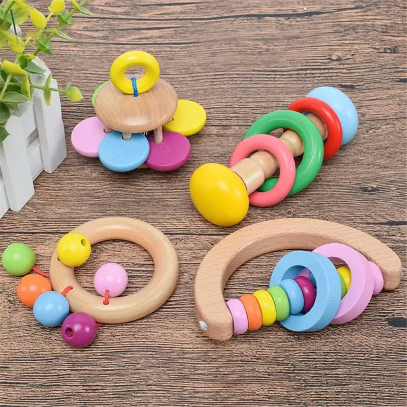 

4Pcs Montessori Wooden Rattles Hold Rattle Hand Bell Gift Baby Toys Toddler Infant Toy