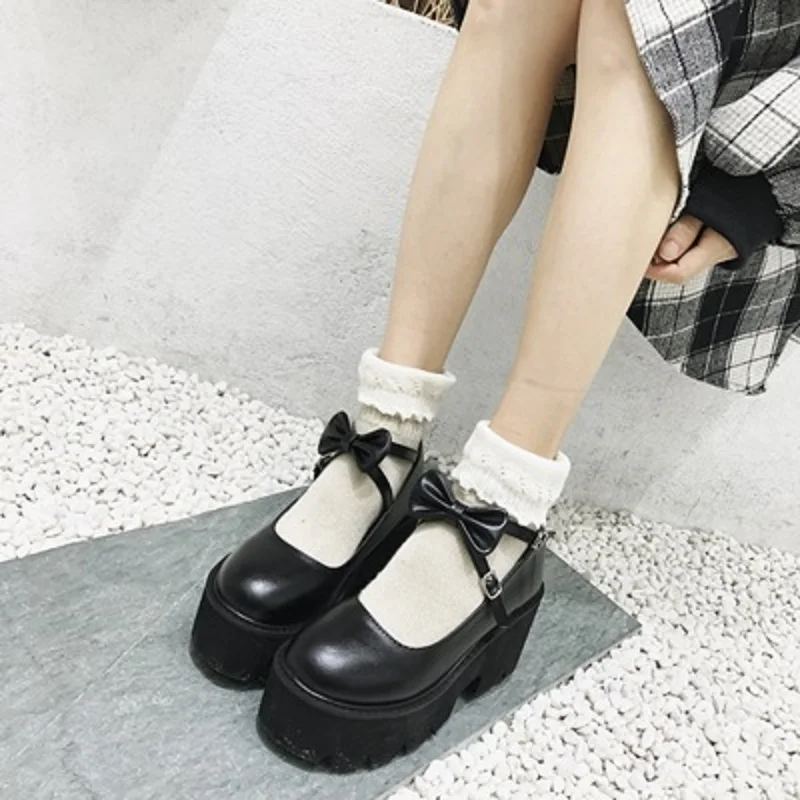 

Spring And Autumn Hot Sale Japanese Cute Bowknot One Word Buckle Platform Wedge Heel Ladies Small Leather Shoes Large Size 40.