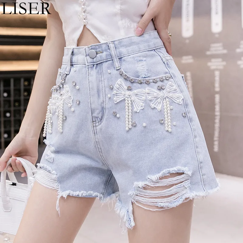 

2022 Summer New Ripped Light Blue Denim Shorts Women'S Fashion Design Stitching Beaded Bow High Waist Slim Shorts LL800