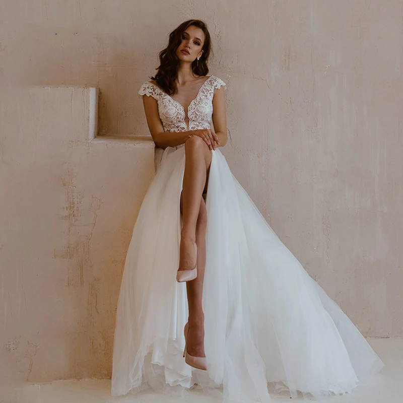 

Wedding Dresses 2021 Wedding Dress Sleeveless V Neck Lace Applique Open Back Tulle A Line Wedding Bridal Gowns Vestido De No