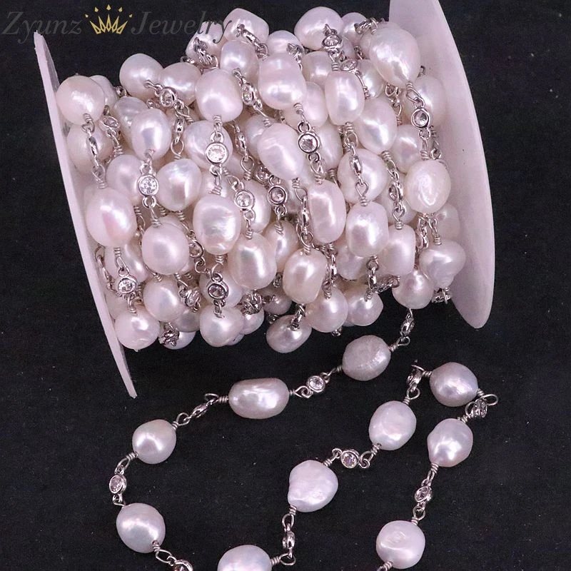Цепочка с пресноводным жемчугом и белым цирконием разделенная бусинами из