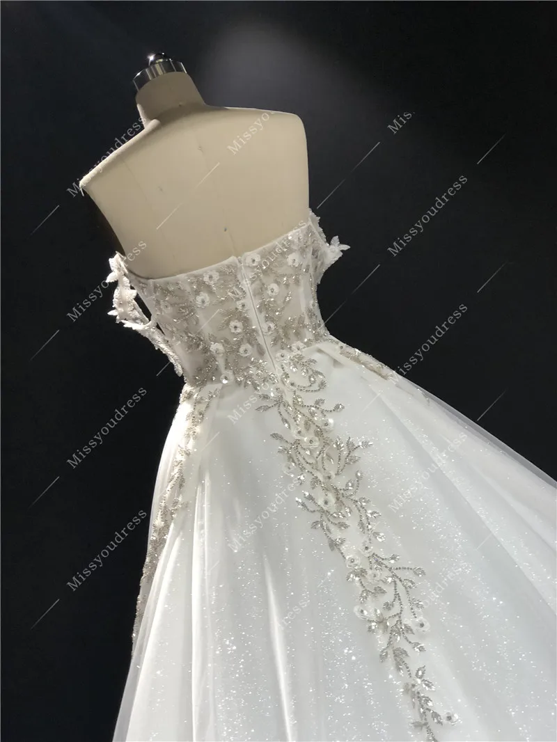 2021 Newest High Quality Real Sample Ivory Sweetheart Strapless A-line Heavy Silver Beadings Floor Length Wedding Dress