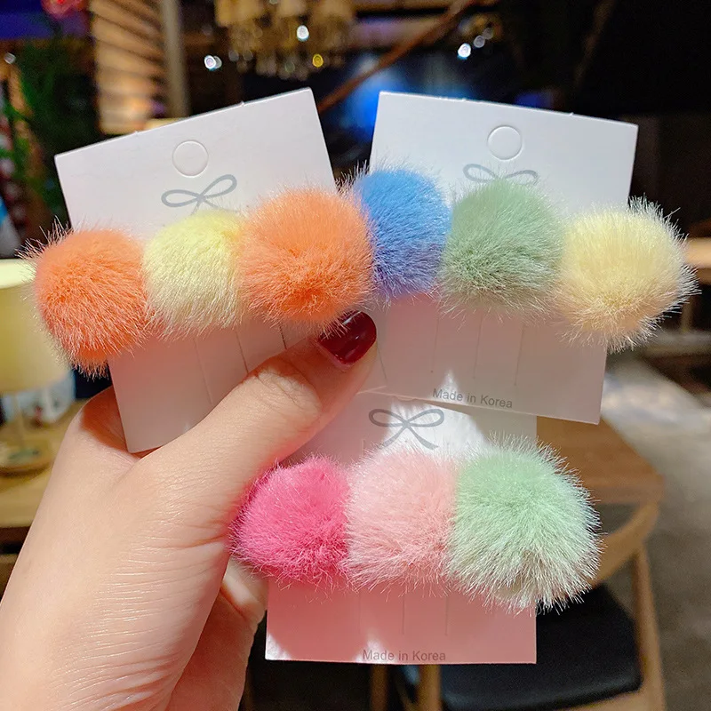 

Autumn and winter new hair ball hairpin girl sweet plush hairpin headdress hit color girl bangs clip hair accessories