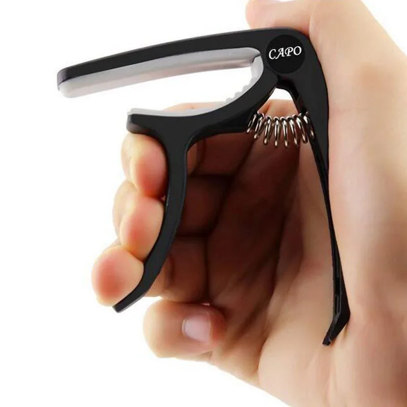 kunststoff gitarre capo für akustische elektrische gitarren klassische gitarre capo ukulele capo mit brücke pin puller free global shipping