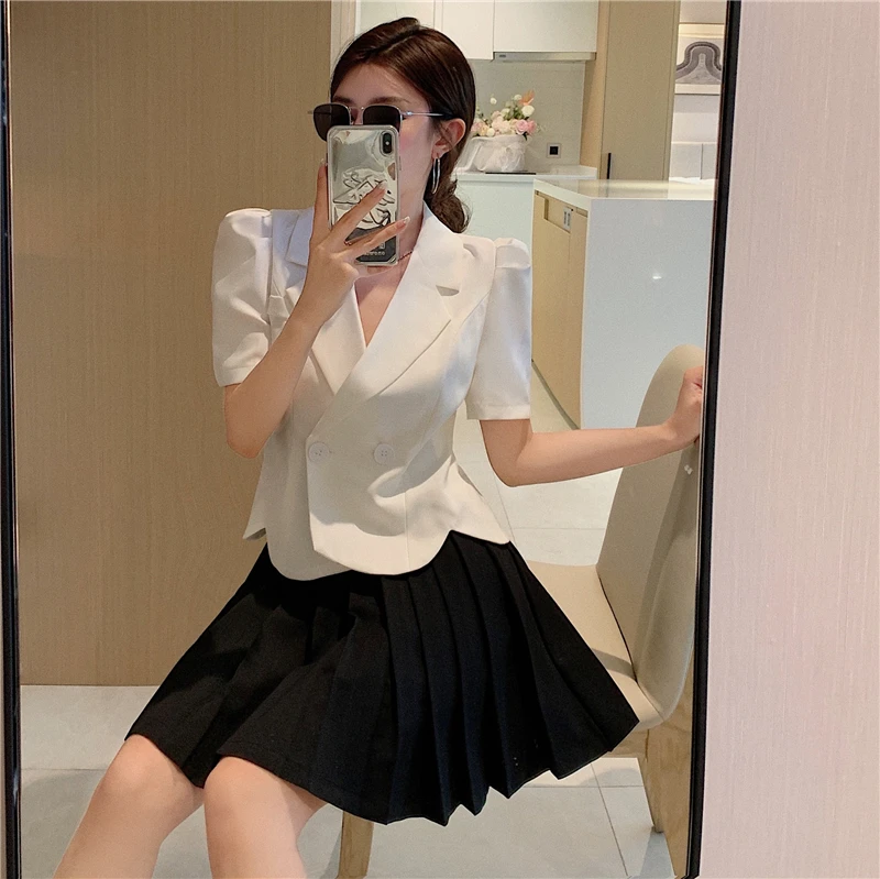 

New fashion design sense ruffled puff sleeve waist short suit jacket + high-waist pleated skirt
