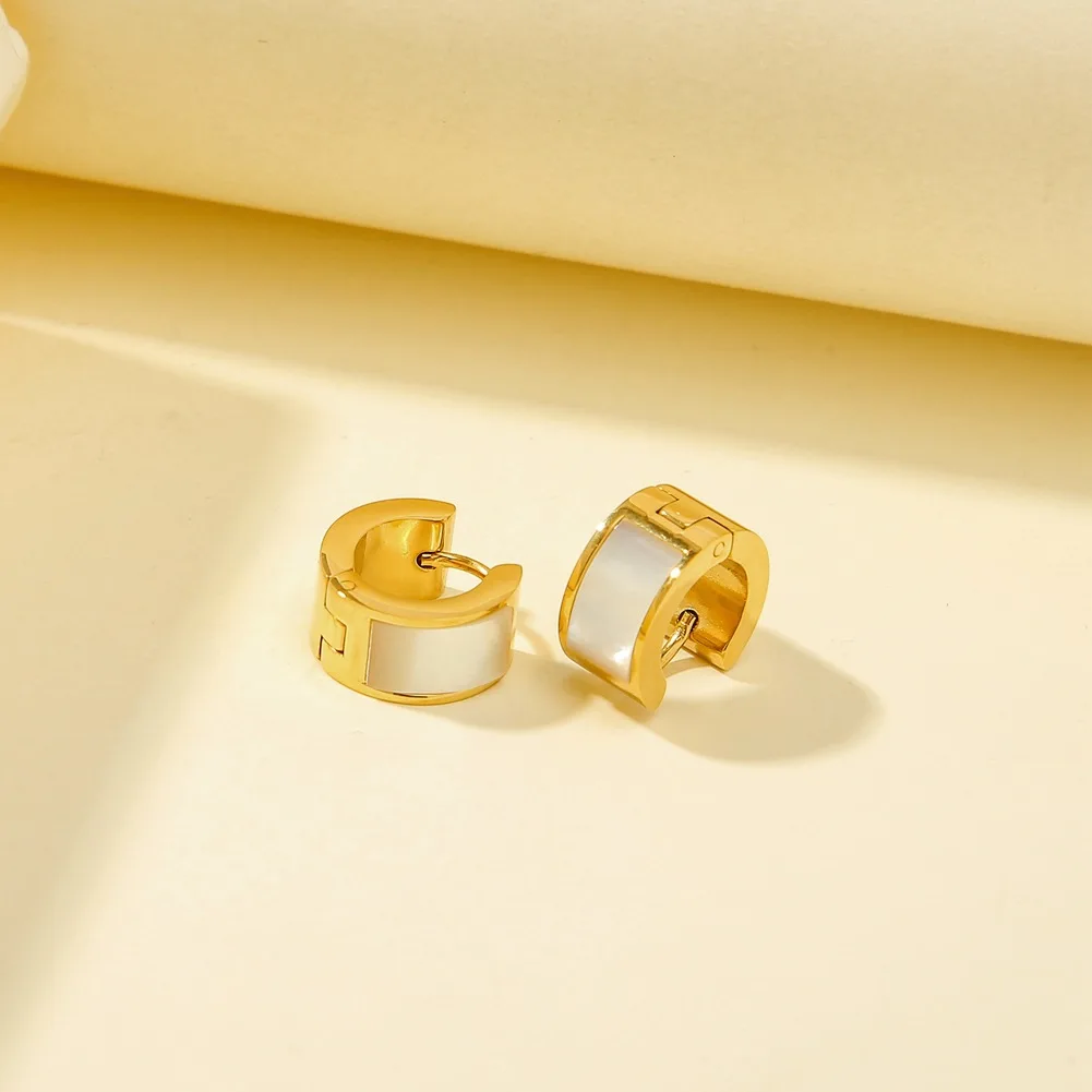 

New titanium steel gilded color simple white Fritillaria temperament ear buckle fashion women's earrings wholesale earrings