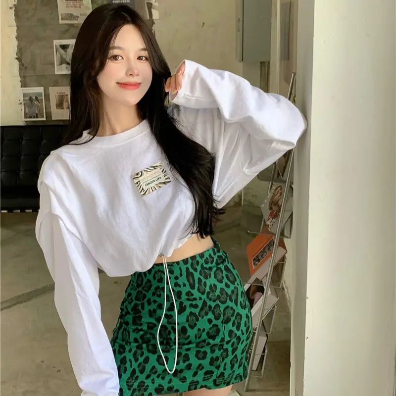 

China's new fashion drawstring waist loose long-sleeve hoodie + leopard print hip high waist skirt two sets in stock