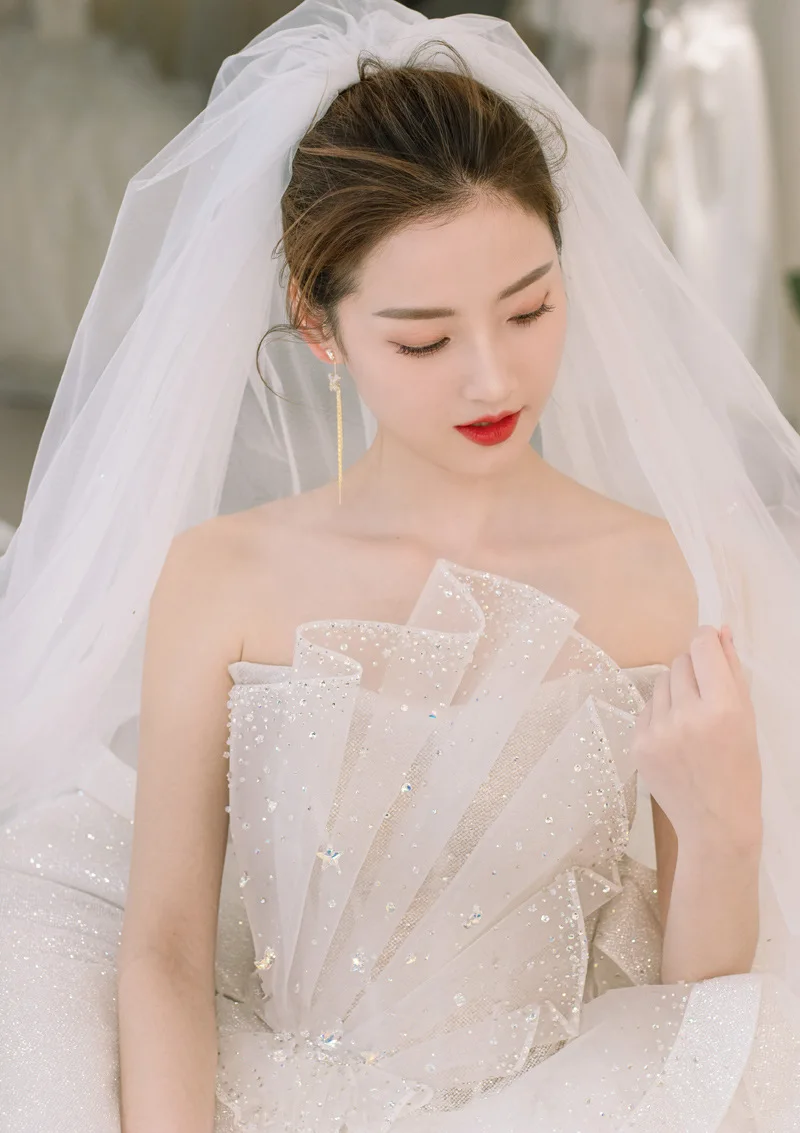 

2022 New Sexy Sleeveless Wedding Dress Embroidered Tulle Strapless Sweep Train Wedding Dress Ball Gown Bridal Dress