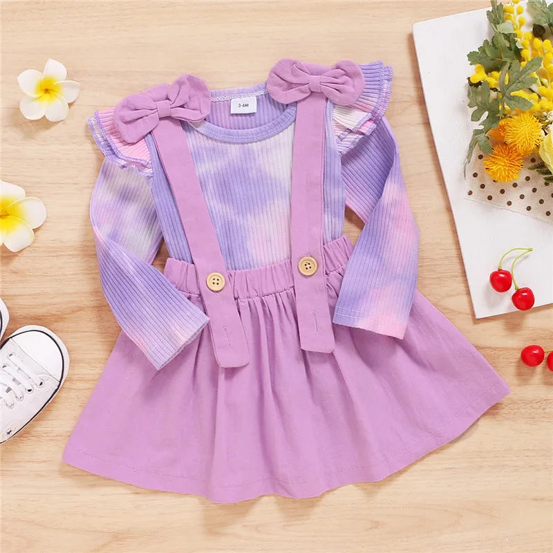

2Pcs Baby Autumn Outfits Fashion Ribbed Tie-Dyed O-Neck Ruffle Sleeves Top + Suspenders Skirt with Bowknot Suit for Toddler Girl