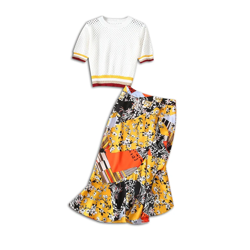 

European vogue of new fund of spring is hollow-out sweater printing irregular package hip temperament fishtail skirt outfit