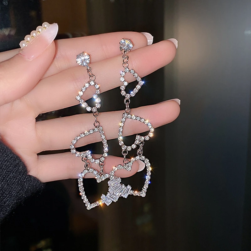 

MENGJIQIAO Korean Luxury Rhinestone Hollow Heart Long Drop Earrings Mujer Moda Bijoux Silver Color Brincos Pendientes Jewelry