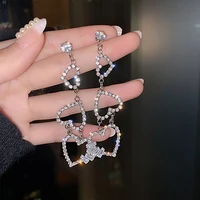 mengjiqiao korean luxury rhinestone hollow heart long drop earrings mujer moda bijoux silver color brincos pendientes jewelry