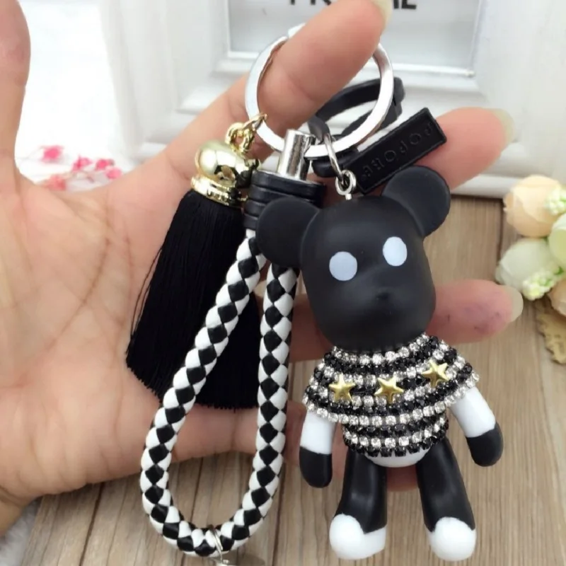 

Korean version of the creative gift local gold violent bear keychain car key chain tassel pendant cute cartoon bag hanging star