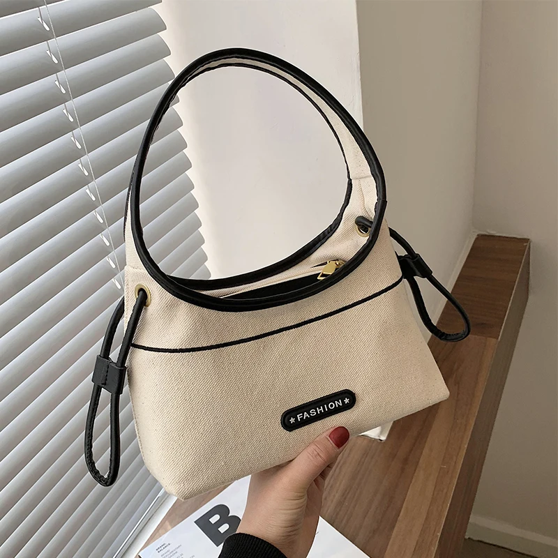 

Canvas bag women's summer 2021 new fashion portable bucket bag ins niche high sense shoulder armpit bag