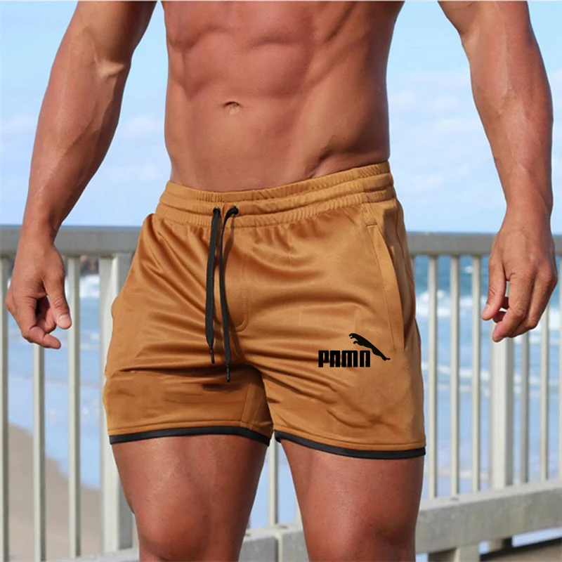 

2020 will see new men's fitness shorts short casual beach shorts running cool jogging fitness shorts Board Shorts tooling shorts