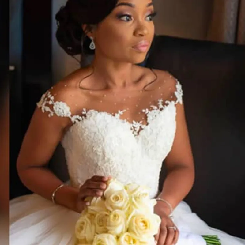 

Elegant Lace Ball Gown Wedding Dress