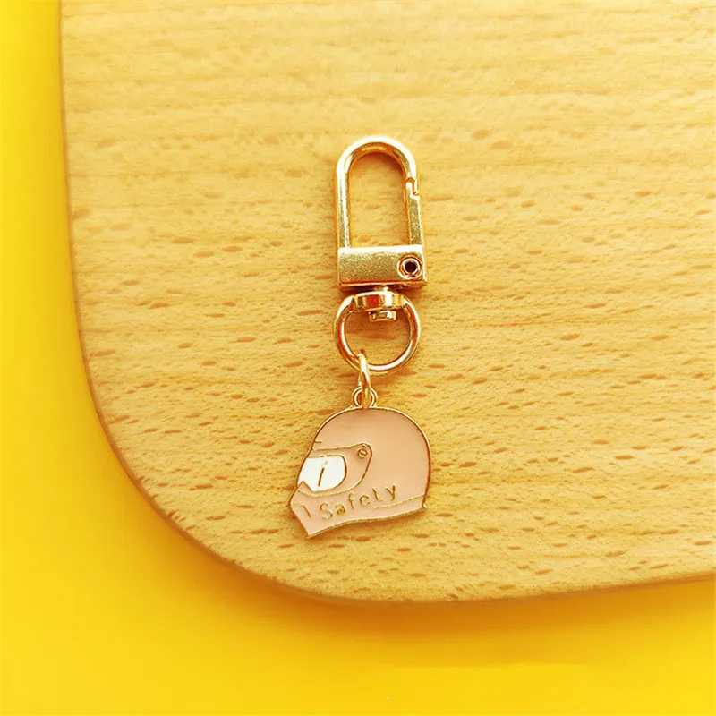 

2021 Fashion Wacky Helmet Electric Car Couple Key Chain Cartoon Keychain Bag Pendant Key Ring Pendant Girl Men Lucky Gifts