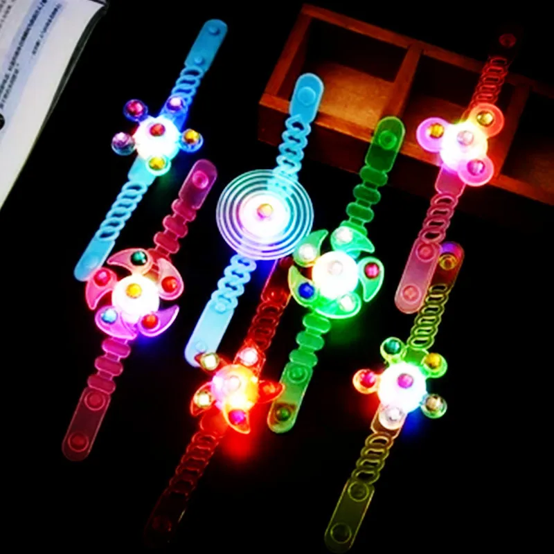 

Fashion New Luminous Wrist Band Manual Rotating Soft Flash Gyro Bracelet for Kids LED Cartoon Lights Glow In The Dark Toys