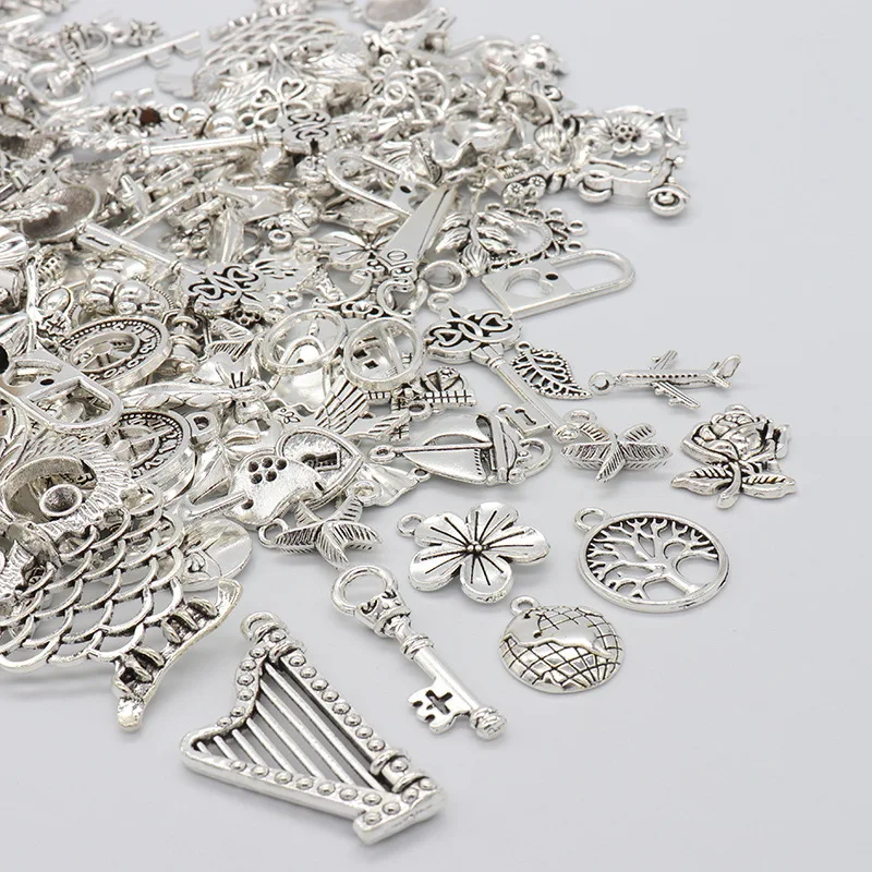 

HEYUYAO 100g Vintage Metal 3 color Mix Size Random Style Charms Pendant For Jewelry Making DIY Handmade Jewelry