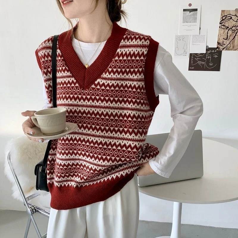 

Autumn and winter V-neck knitted waistcoat women's sweater vest Korean loose striped sweater with thickened student trend