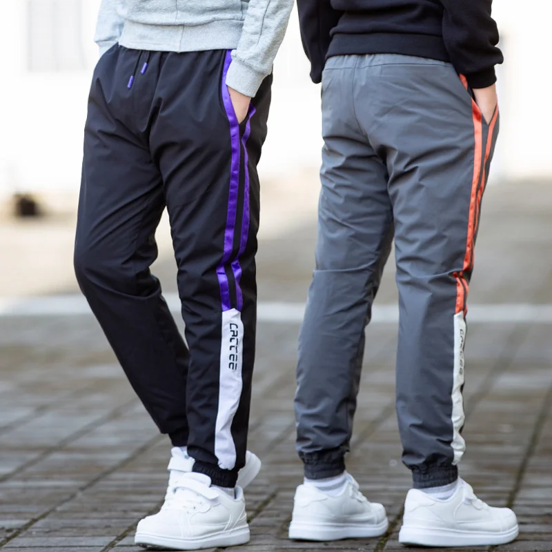 Детские теплые штаны для мальчиков зимние ветрозащитные спортивные больших