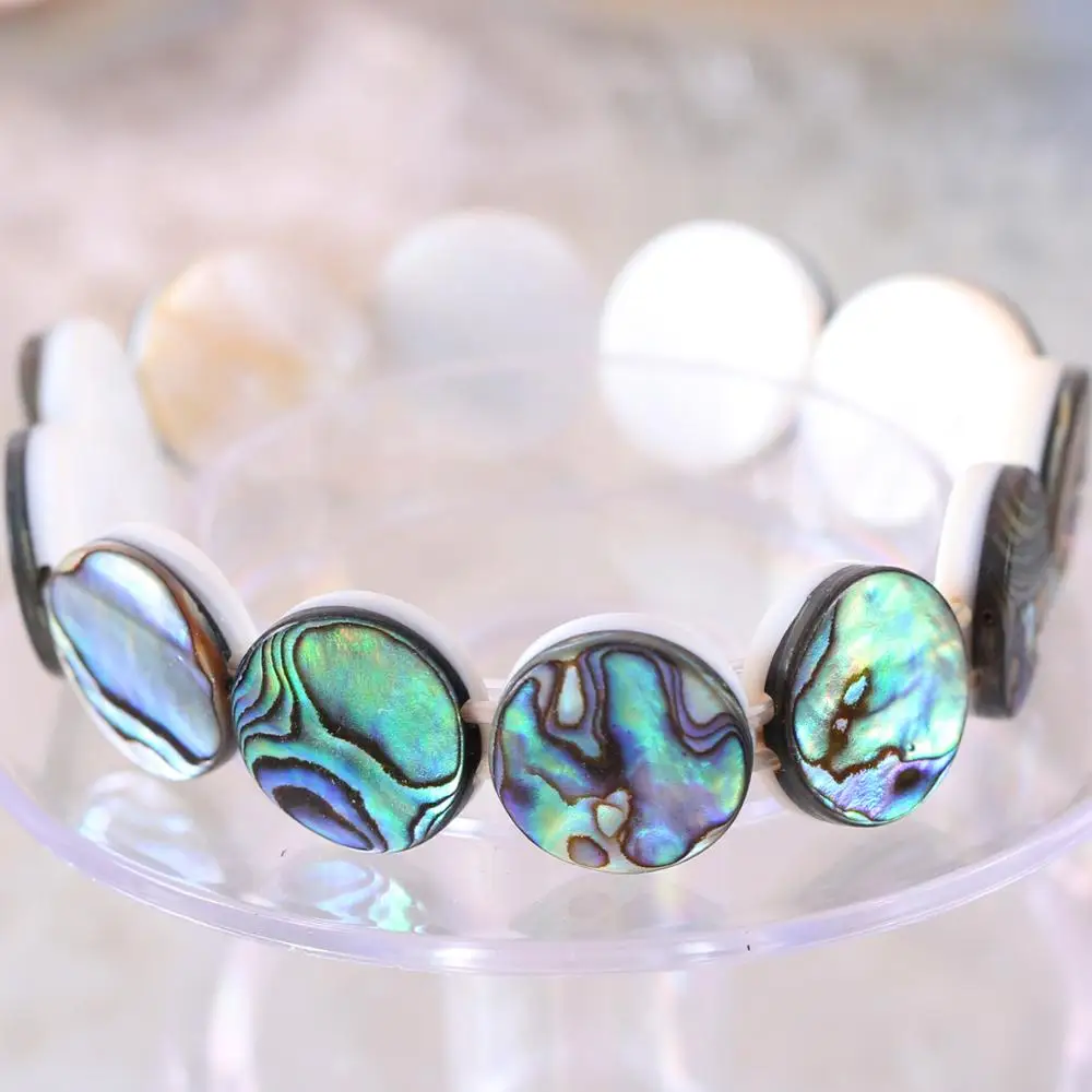 Браслет натуральный 16 мм круглые бусины синий Новая Зеландия ушка оболочки