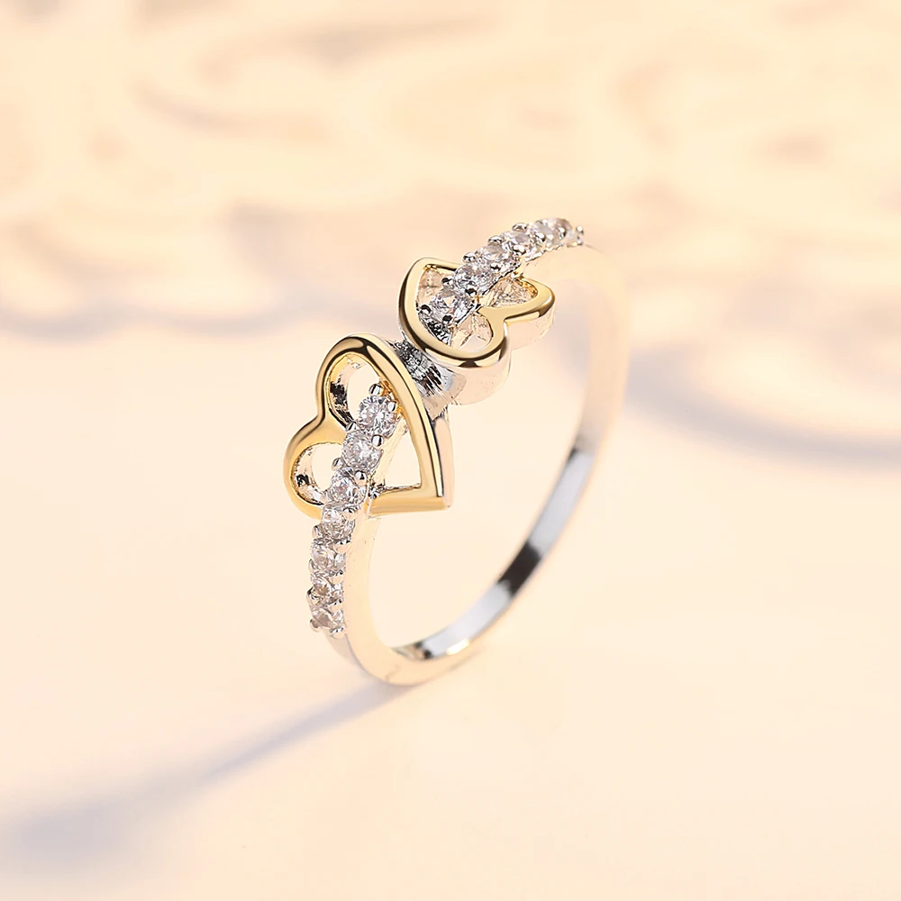 Женское кольцо с двойным сердцем и фианитом в классическом стиле | Украшения