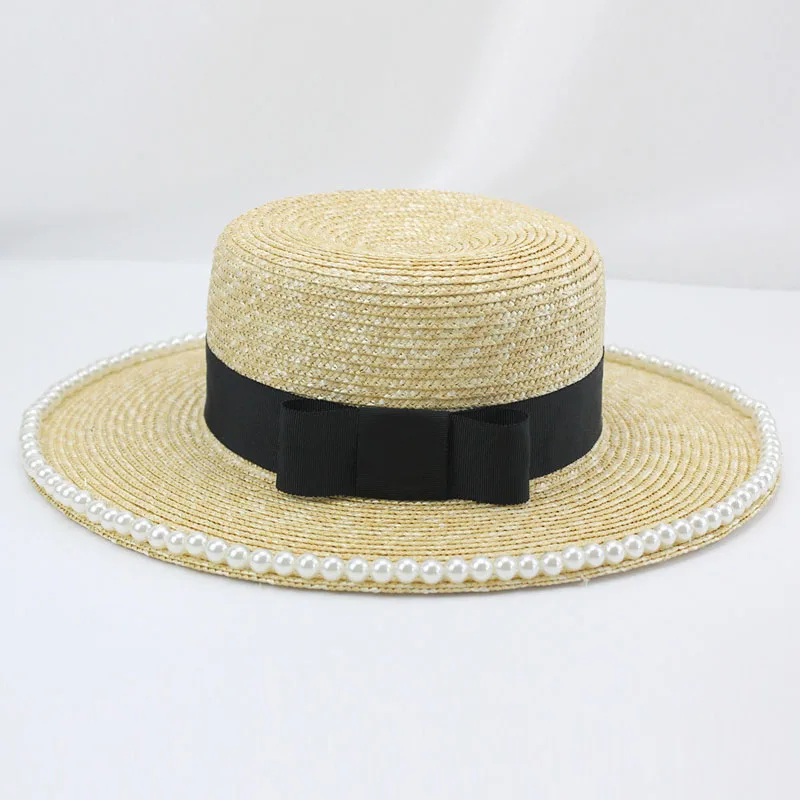 

Fine Wheat Straw Boater Hat Women Black Ribbon Bow Wide Brimmed Dress Sun Hat Elegant Pearls Flat Panama Beach Ladies Summer Hat