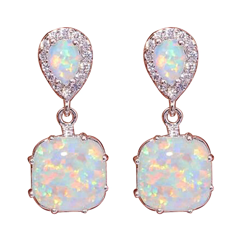 Женские серьги-гвоздики с подвеской в виде огненного опала | Украшения и