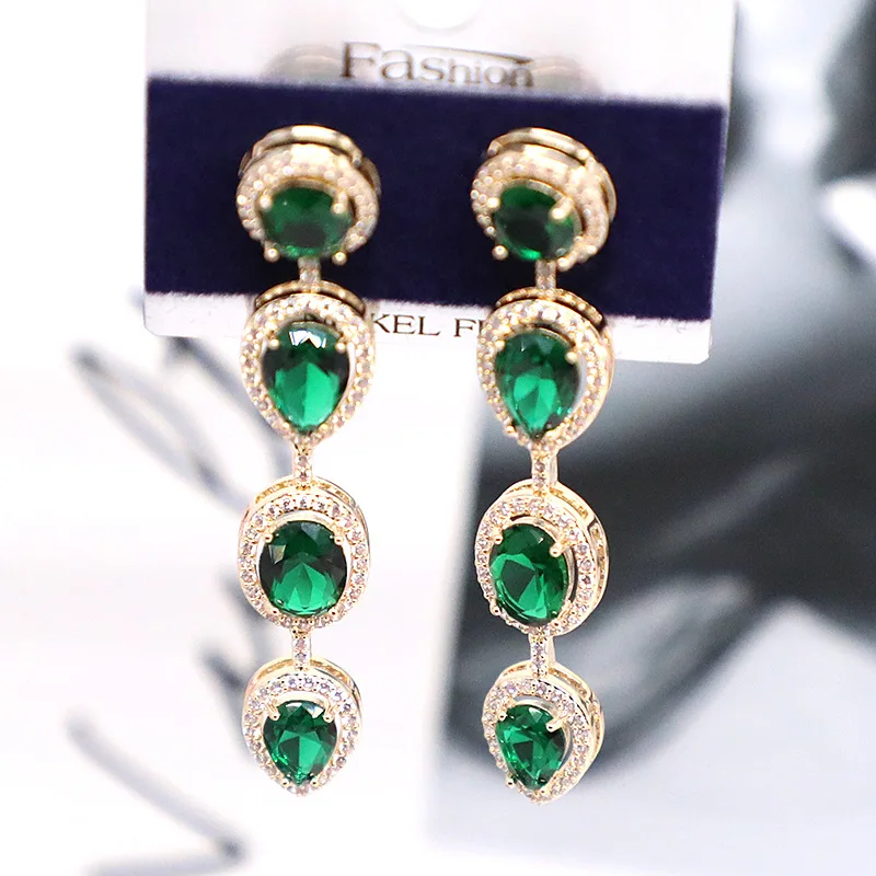 

Серьги с зеленым цирконием и искусственным кристаллом 210318-20