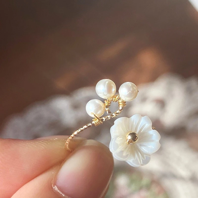 

Anime Tian Guan Ci Fu Xie Lian Rings Small White Flower Natural Pearl Handmade Gift Winding Finger Ring Fashion Jewelry Cosplay