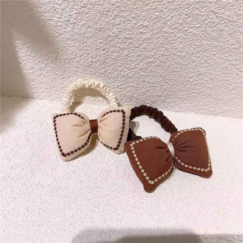 

2021 Winter Korean New Sweet Girl Cute Coffee Color Bow Rubber Band Hair Rope Fashion Children's Ponytail Hair Accessories