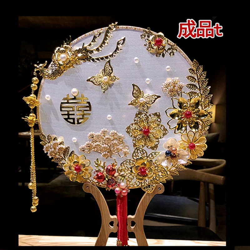 

Chinese bride group fan ancient wind out of the wedding hand holding flowers wedding fan wedding fan finished product pink fan