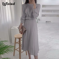 round neck dress 2022 spring and autumn new korean style design sense back strap casual mid length a line pleated dress women