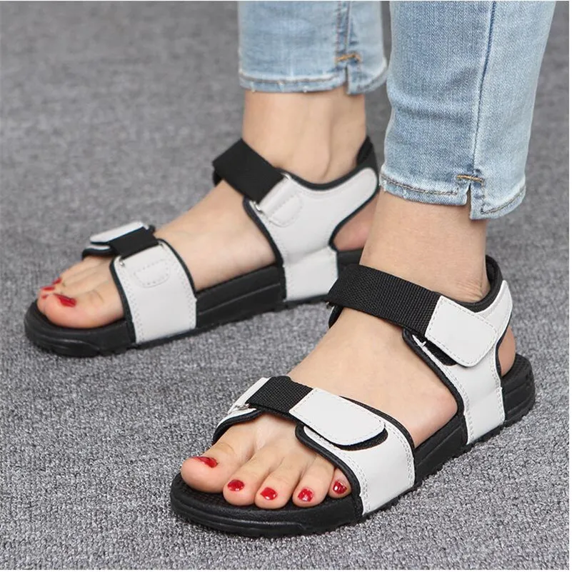 

Genuine Vietnamese rubber sandals Baotou flat bottom wearable comfortable female sandals outdoor leisure beach women's shoes