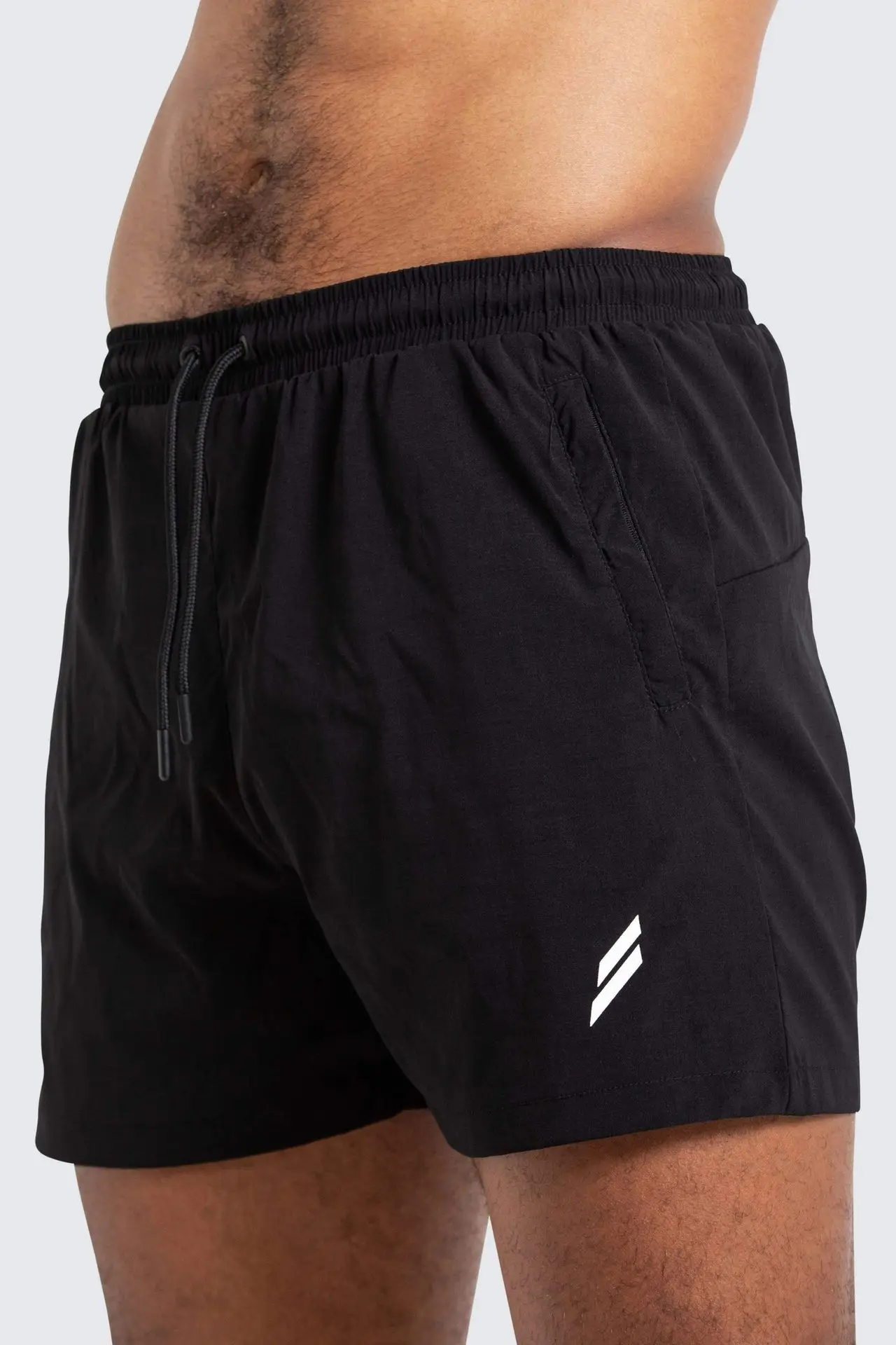 

2021 new solid color pocket men's shorts, home pants, smooth beach pants, slim fit pants, sports shorts