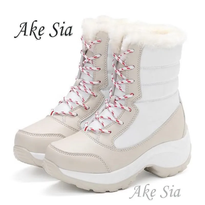 Женские сапоги для снежной погоды теплые осенне зимние на платформе до середины