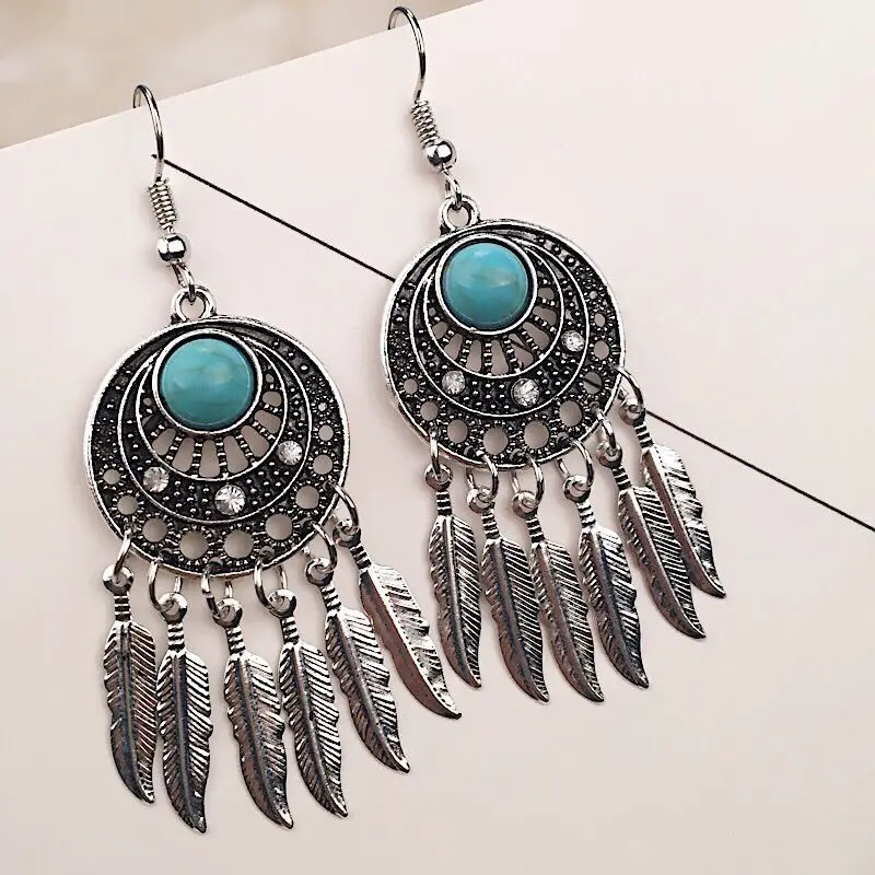 

Retro ethnic style earrings dream catcher leaf tassel turquoise earrings feather tassel