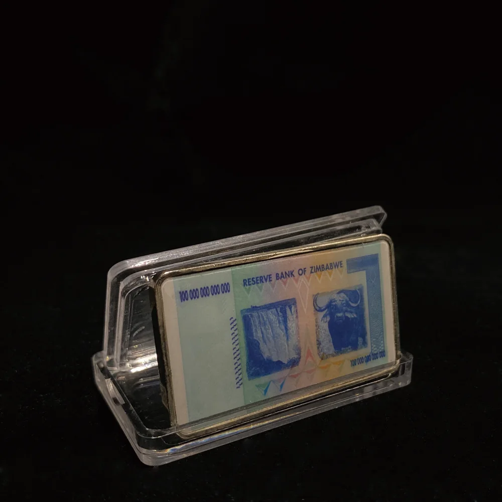 Памятные монеты Зимбабве 100 триллиантов долларов серебряные слитки