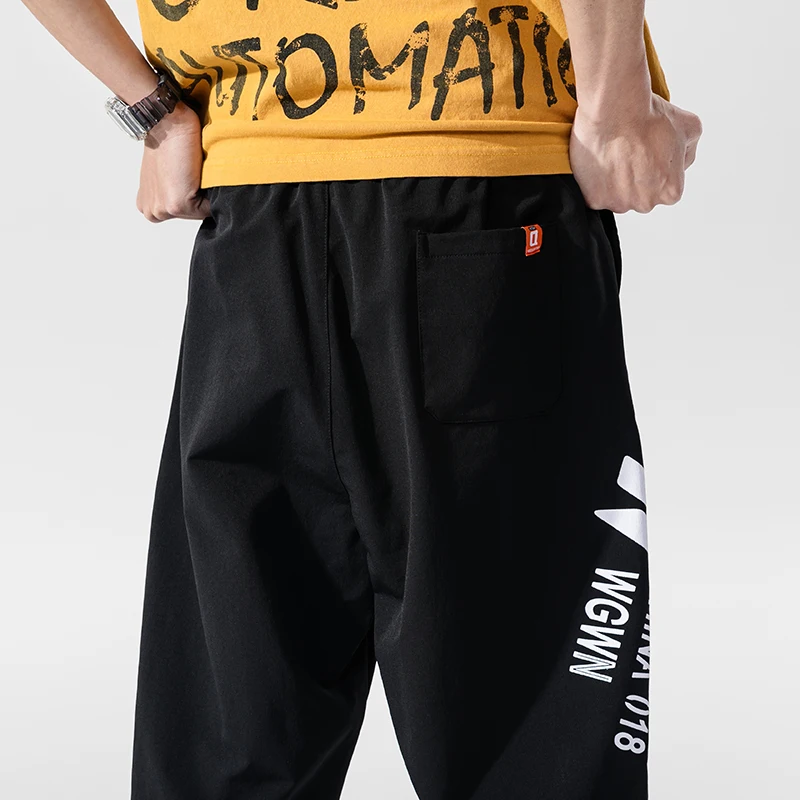 

Summer 2021 New Korean Fashion Casual Handsome Men'S Trousers Fashion Brand Ins Tooling Shorts Boys' And Students' 7-Point Pants