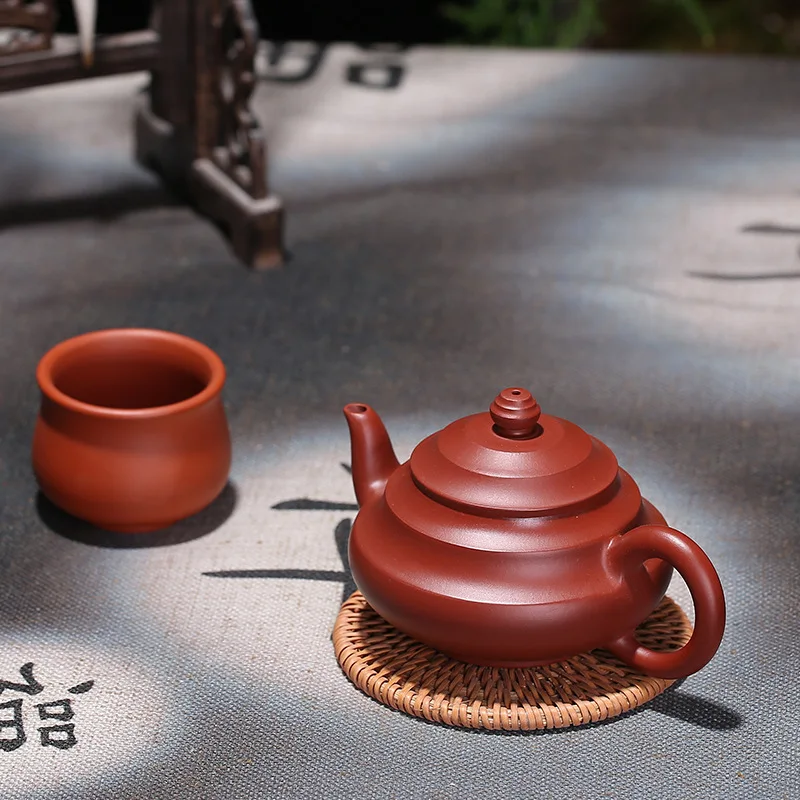 

Purple clay pot Yixing Yuan Youjun step by step rising pot vermilion clay handmade pot Dahongpao sand lamp pot in the rain