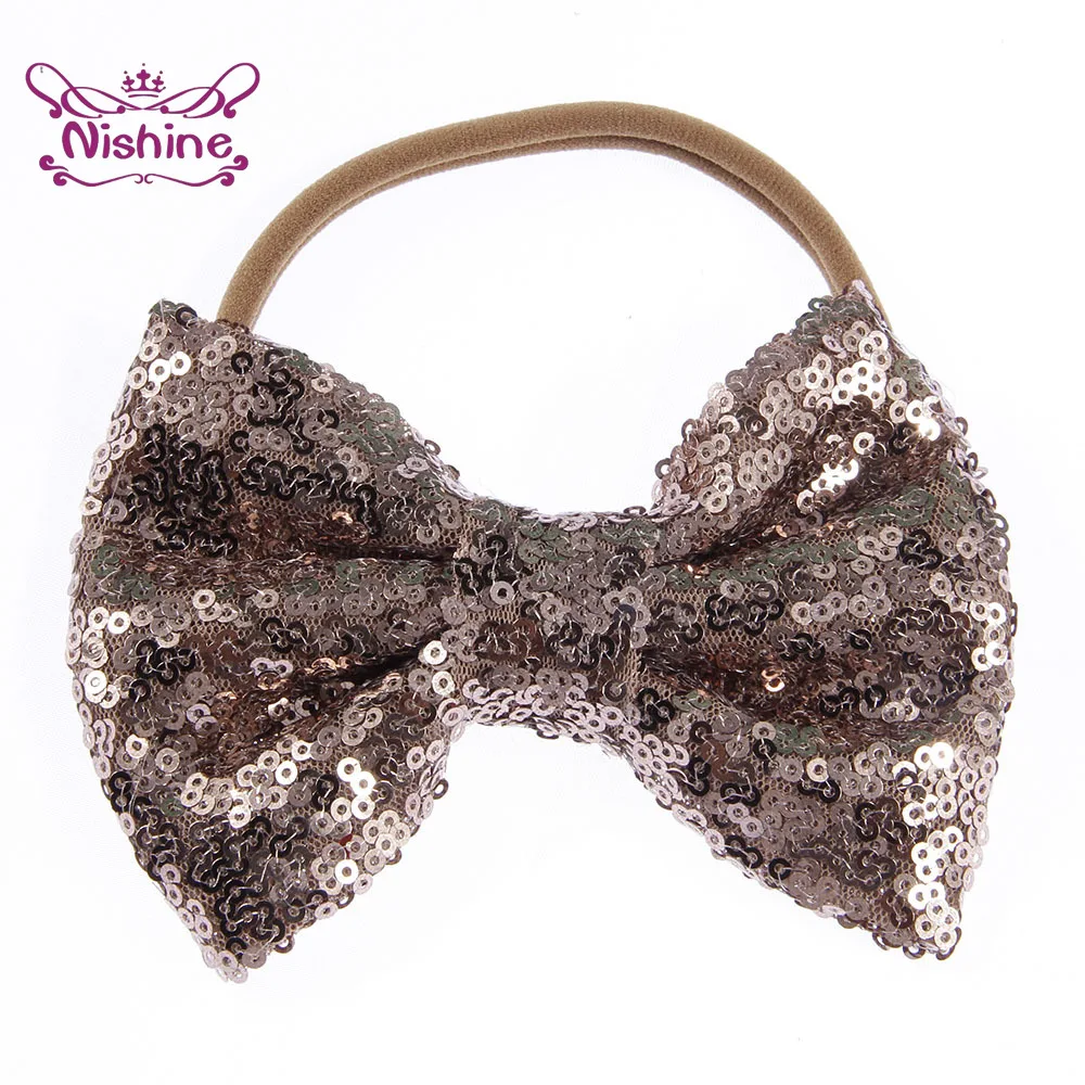 Повязка на голову для девочек нейлоновая однотонная с блестящим бантом большой