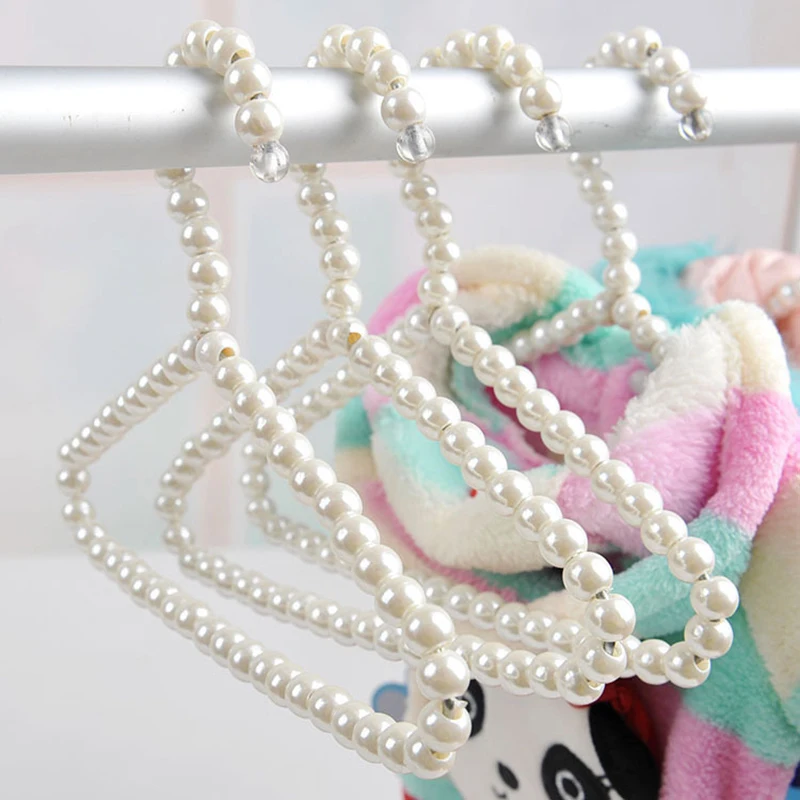 

Hangers 1Pcs Children Pearl Hanger Fashion Dog Hangers For Clothes Baby Pearl Plastic Pet Hangers 20cm Wardrobe Storage