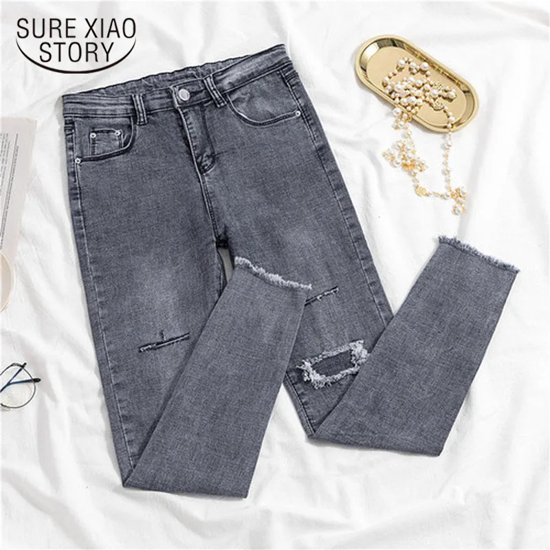 

2020 Korean Fashion Jeans Female Denim Pants Hole Button Women's Pencil Pants Gray Denim Elastic Trousers for Ladies Donna 10633