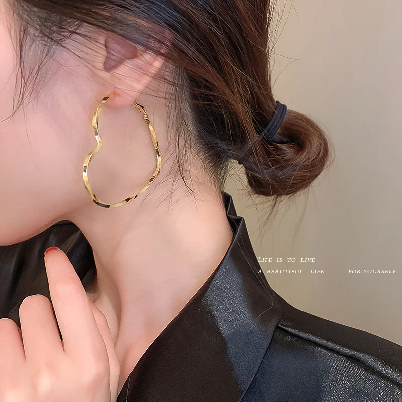 

European and American personality exaggerated plain circle love earrings female S925 silver needle temperament retro ear jewelry