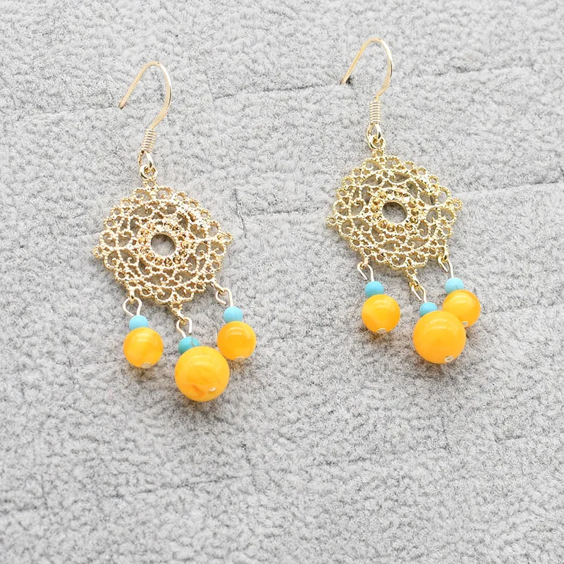 

New Earrings for the lady, Small Round Beeswax pendant, ethnic charm