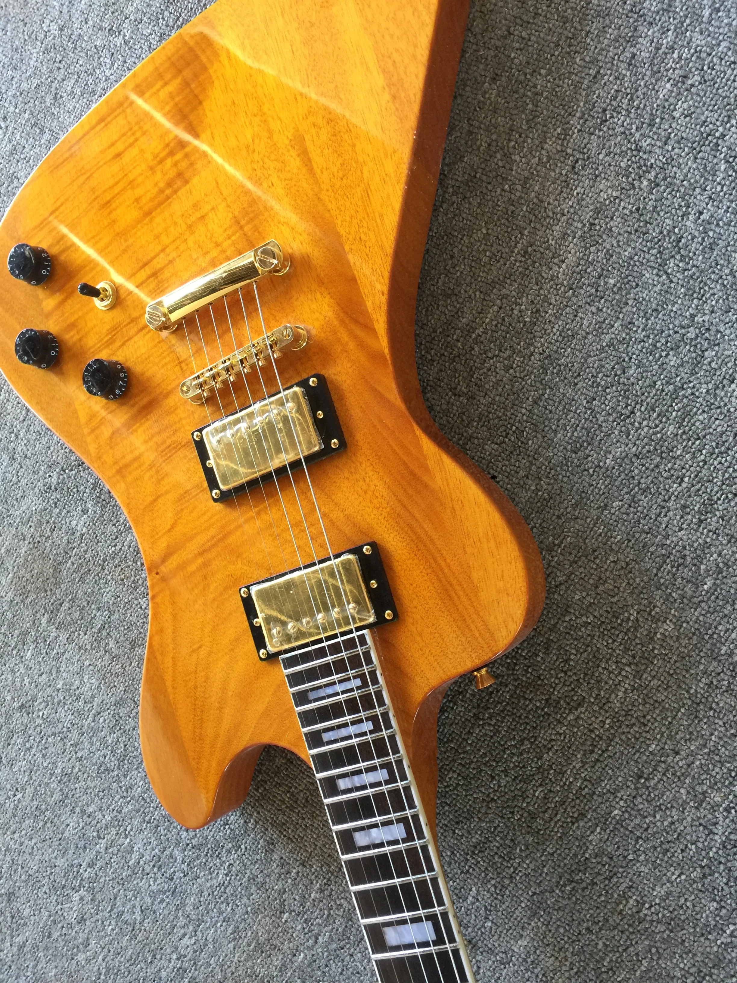 

Free delivery / transparent yellow rosewood fingerboard high quality special shaped Guitar / China Electric Guitar