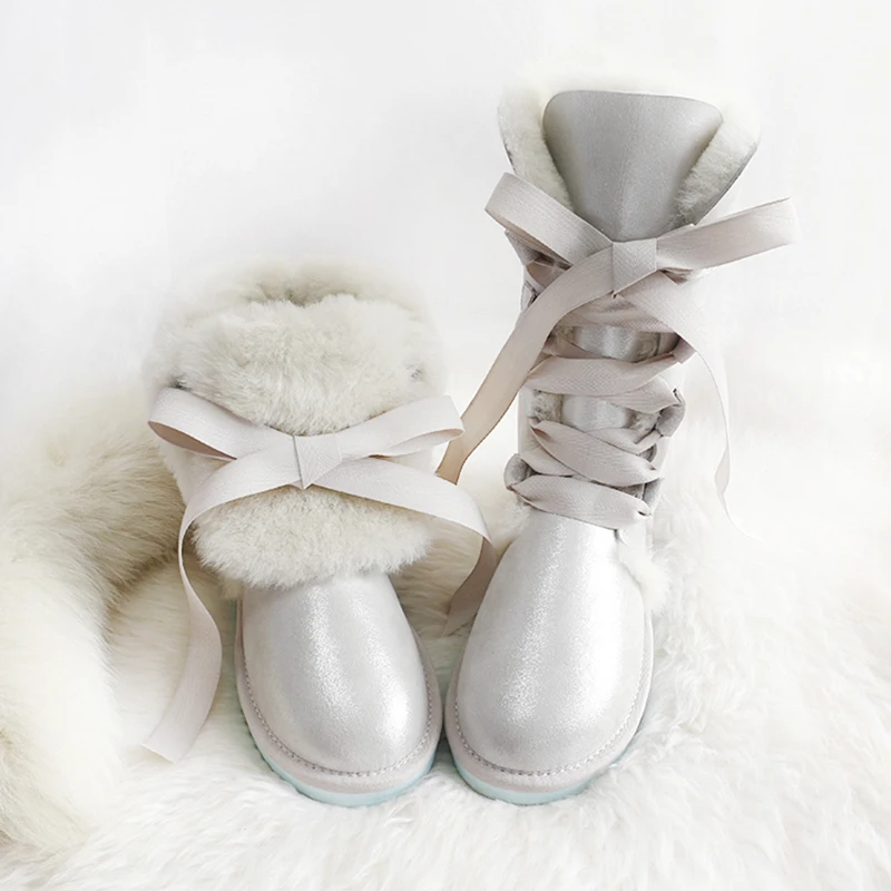 spesifikasi Baru Kulit Domba Sepatu Bot Salju Australia Lutut Tinggi Musim Dingin Wol Alami Boots Domba Sepatu Bulu Lutut Busur Flat Wanita Sepatu Bot Panjang