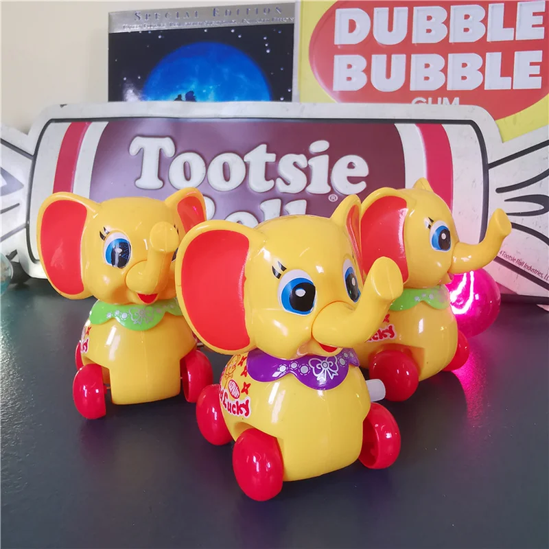 

Disney Anime Dumbo Kawaii Doll Good Luck Baby Elephant Movable Clockwork Car Model Boy Girl Kids Toys Gift
