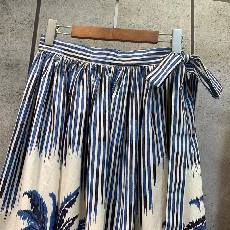 

2021 spring and summer vacation new tropical style animal print medium length pleated skirt made of imported fine cotton